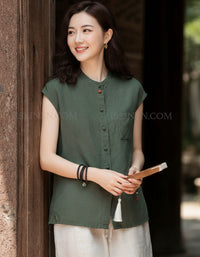 Women’s sleeveless button up casual shirt front view beige