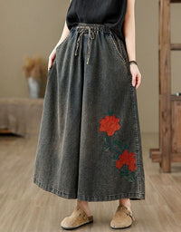 Women’s vintage wide leg denim pants with floral embroidery and elastic waist