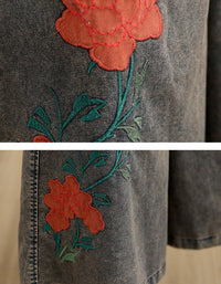 Wide leg denim pants featuring red floral embroidery detail