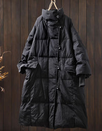Full-length image of women’s black long puffer coat worn casually with everyday winter outfits