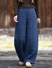 Navy quilted wide leg pants styled with knit top for casual fall outfit