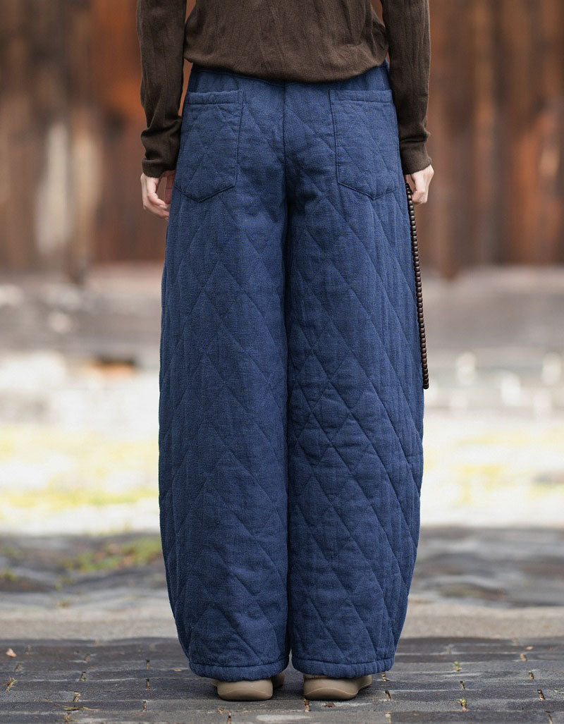 Back view of women’s padded wide leg pants in navy color
