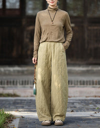 Quilted wide leg pants styled with knit top for casual fall outfit