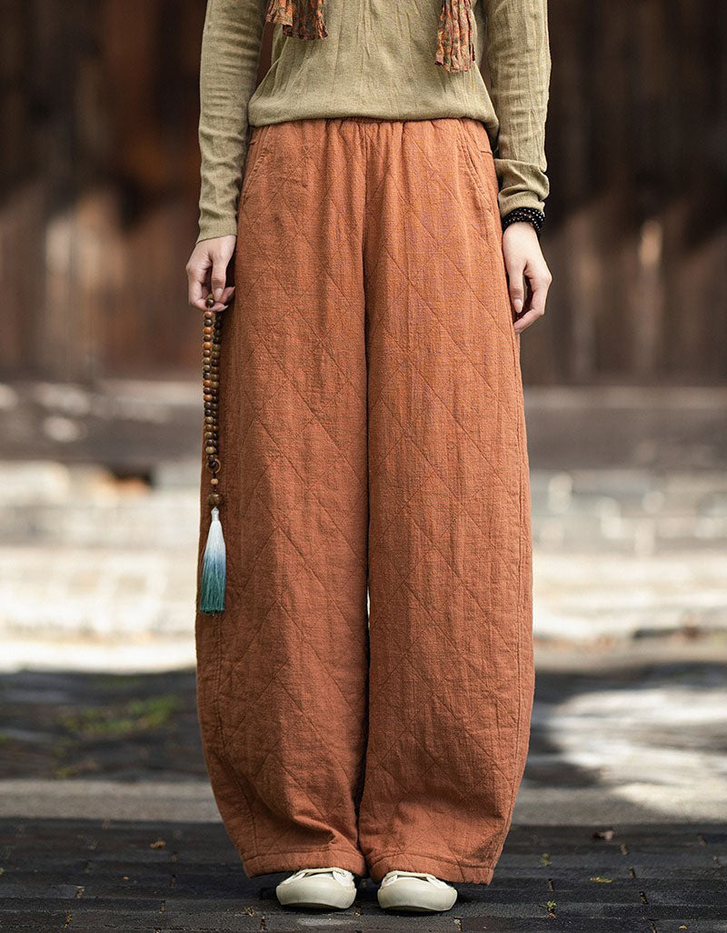Orange Quilted wide leg pants styled with knit top for casual fall outfit