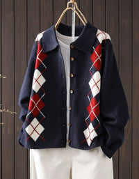 Women's navy argyle knit cardigan with collar and brown buttons, front view
