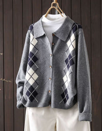 Women's light gray argyle knit cardigan with collar and brown buttons, front view