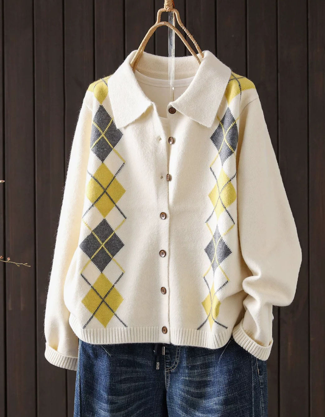 Women's beige argyle knit cardigan with collar and brown buttons, front view