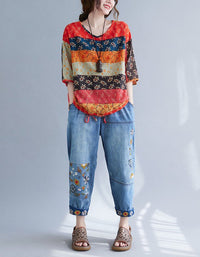 Women wearing a boho floral top and embroidered denim pants set, perfect for casual wear