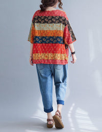 Women wearing a boho floral top and embroidered denim pants set, perfect for casual wear back view